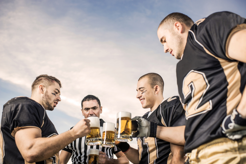 American football players and the referee celebrating their victory, they are toasting with beer. [url=http://www.istockphoto.com/search/lightbox/9786738][img]http://dl.dropbox.com/u/40117171/group.jpg[/img][/url] [url=http://www.istockphoto.com/search/lightbox/9786766][img]http://dl.dropbox.com/u/40117171/sport.jpg[/img][/url]
